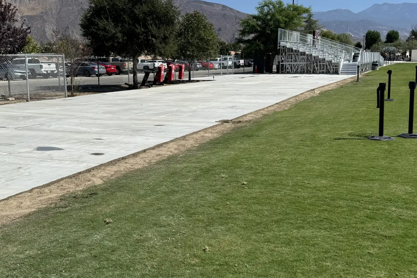 San Jacinto Valley Academy concrete sidewalk along athletic field